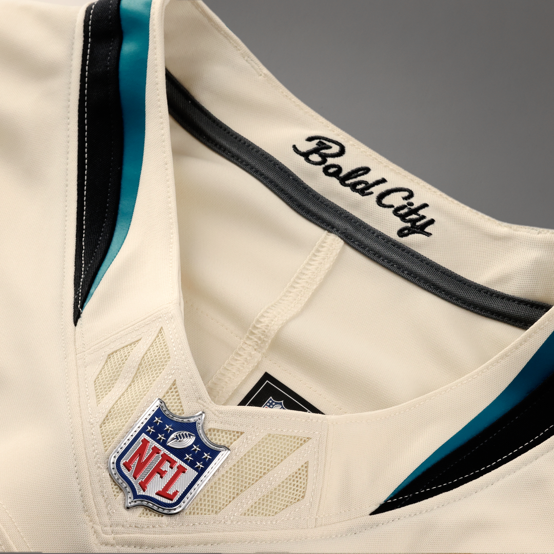 Jacksonville Jaguars Travis Hunter Nike Natural 2026 Rivalries Collection Stitched Limited Jersey